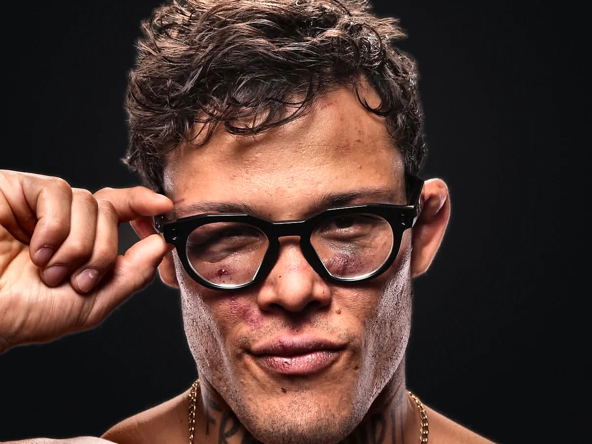 Caio “The Natural” Borralho wearing glasses, studio portrait