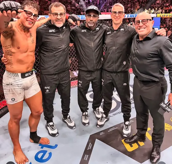 The team in the UFC Octagon